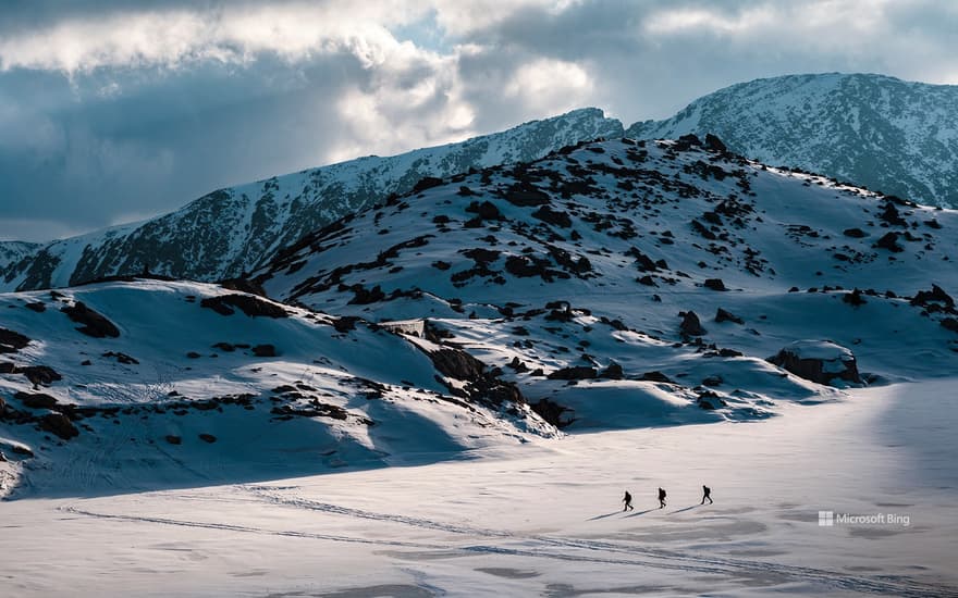 Explorers in a frozen lake, Estany de Colomina, Lérida, Catalonia, Spain