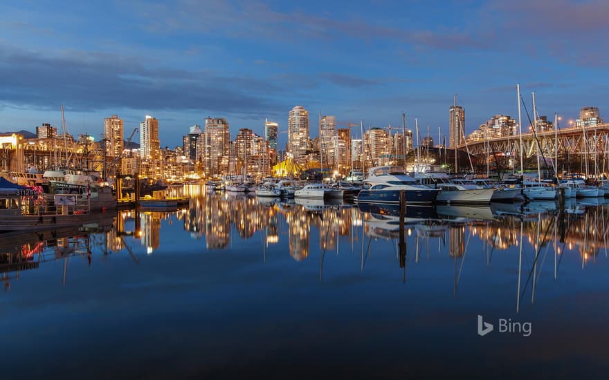 Boats resting between the Granville Bridge and the Burrard Bridge in False Creek, Vancouver