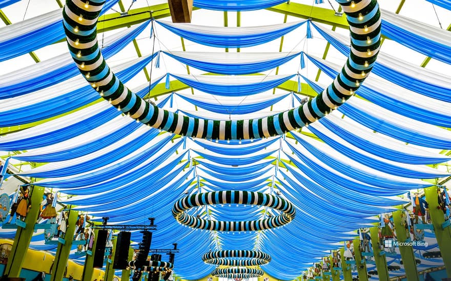 People in the “Spaten” beer tent at the largest folk festival in the world, Oktoberfest 2017, Munich, Bavaria